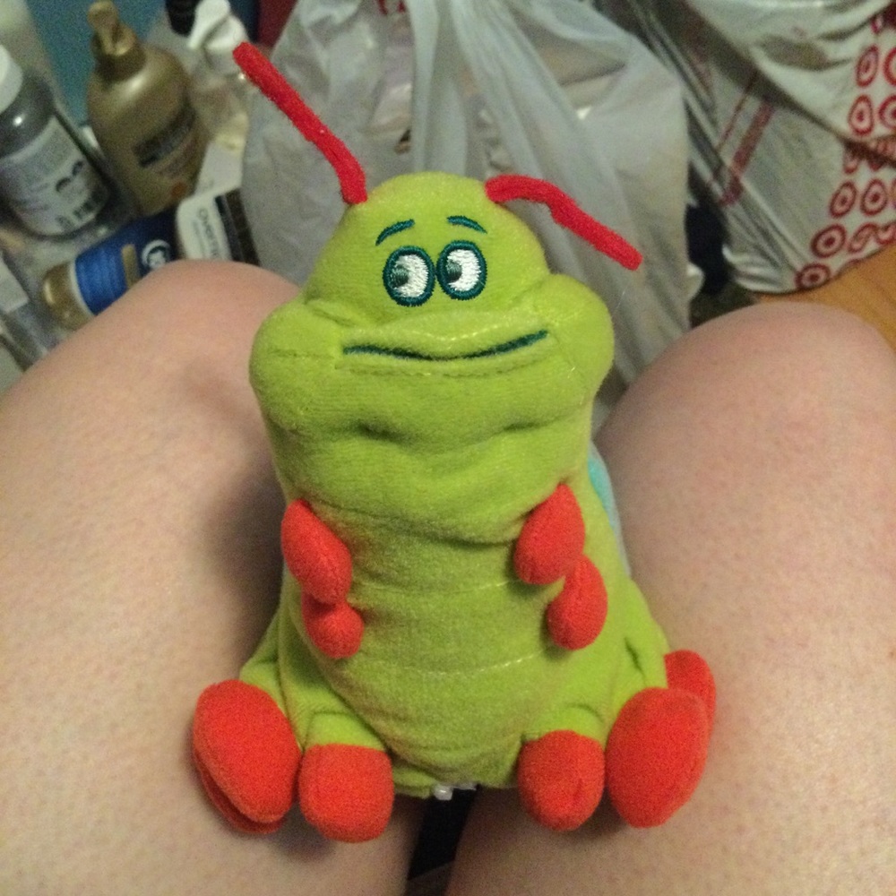 Bug’s Life Heimlich the Caterpillar stuffed toy with zippered pouch.